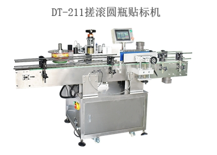 AUTOMATIC ROLL AND ROLL LABELING MACHINE FOR ROUND BOTTLE