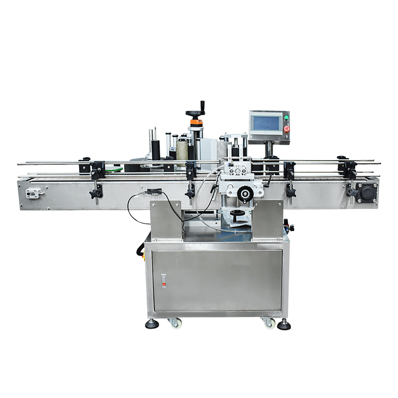 AUTOMATIC LOCATING AND LABELING MACHINE FOR ROUND BOTTLE